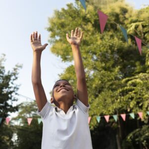 medium-shot-smiley-kid-outdoors